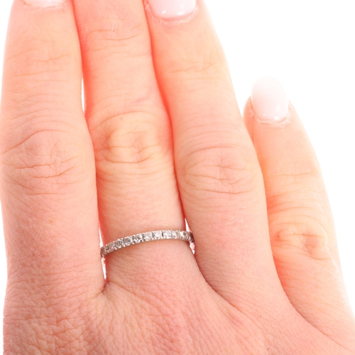1171 - An 18ct white gold diamond three quarter eternity band ring, set with modern round brilliant-cut dia... 