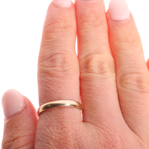 1191 - A 9ct gold wedding band ring, maker J Ltd, London 1984, band width 3mm, size R, 1.7g