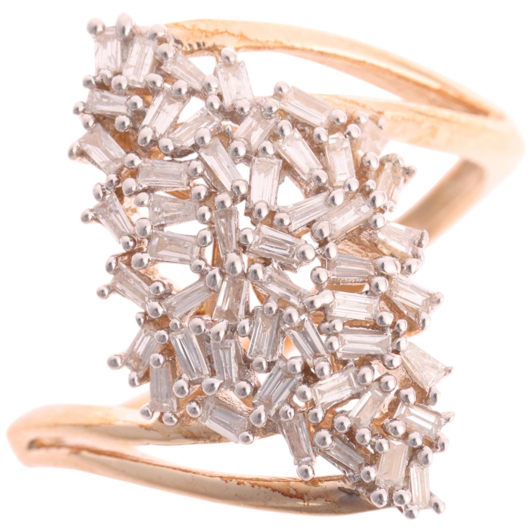 A 9ct gold diamond cluster crossover ring, TJC, set with baguette-cut ...