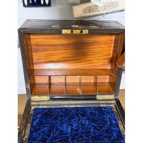 273 - A 19th century rosewood toilet/sewing box, with inlaid brass mother-of-pearl and amboyna marquetry d... 