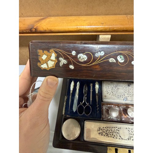 273 - A 19th century rosewood toilet/sewing box, with inlaid brass mother-of-pearl and amboyna marquetry d... 
