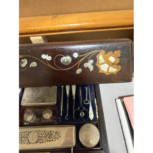 273 - A 19th century rosewood toilet/sewing box, with inlaid brass mother-of-pearl and amboyna marquetry d... 