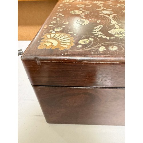 273 - A 19th century rosewood toilet/sewing box, with inlaid brass mother-of-pearl and amboyna marquetry d... 