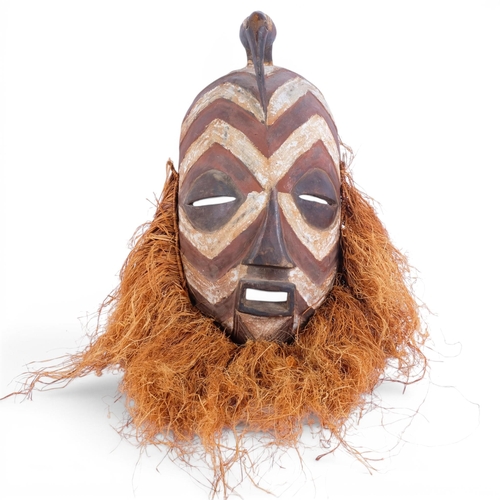 46 - A Vintage Songye (Congo) carved and painted wood ceremonial mask, height excluding straw-work 55cm