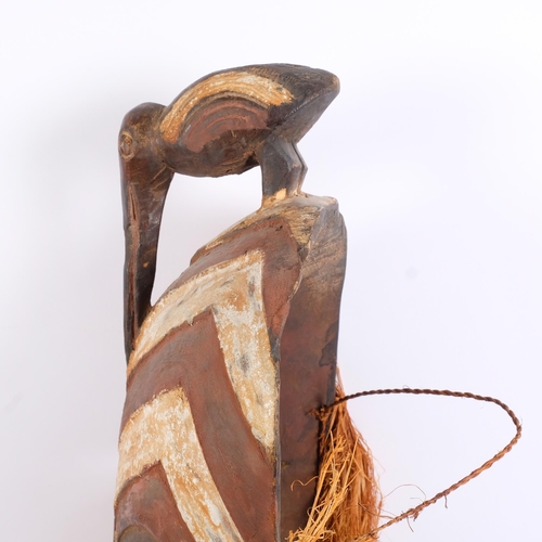 46 - A Vintage Songye (Congo) carved and painted wood ceremonial mask, height excluding straw-work 55cm