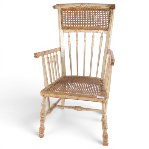 47 - A Swedish child's armchair, 19thC, with original painted finish and cane panels, H77cm (top rail dam... 