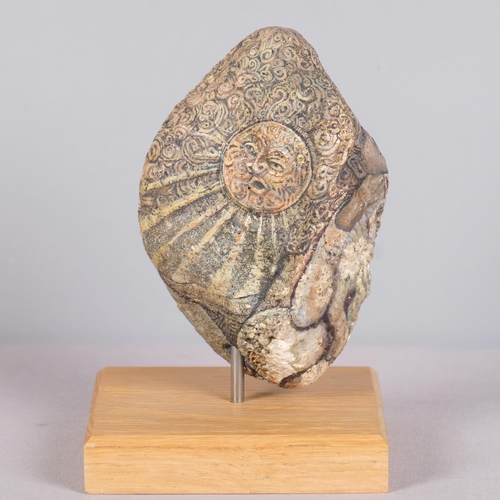 12 - MICHELLE VULAMA, Canada, a hand painted rock with figures holding a cats and sun to reverse, mounted... 