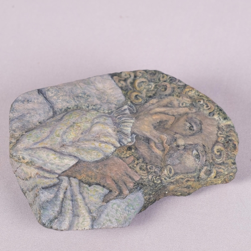 13 - MICHELLE VULAMA, Canada, a hand painted rock with male figure , signed and dated 2000, length 13cm