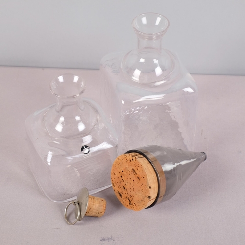 24 - Pukeberg, Sweden, two glass bottles one with stopper and label, together with a GORAN WARFF for Puke... 