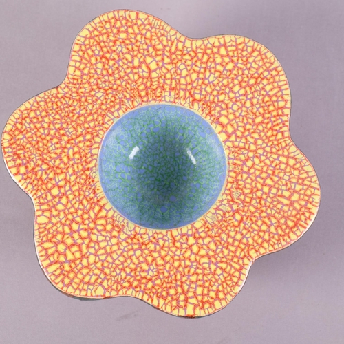 32 - KATE MALONE (b.1959-), British, a studio ceramic flower head or seed pod, double walled with varied ... 