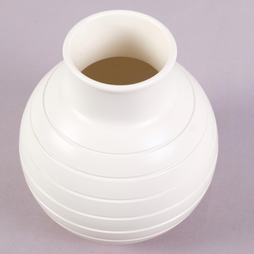 35 - KEITH MURRAY, (1892-1981) New Zealand/British, for Wedgwood, a white 'Bomb' vase, makers marks print... 
