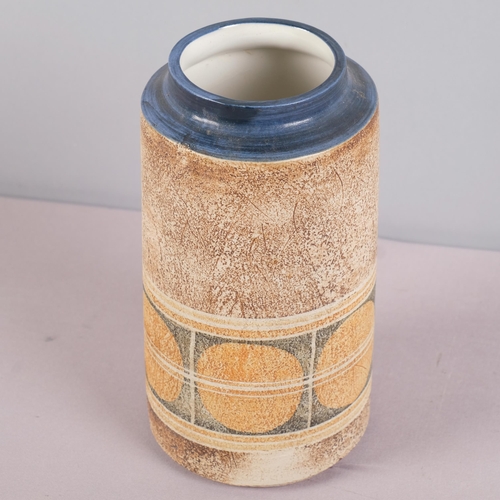 45 - TINA DOUBLEDAY for Troika, Cornwall, a cylinder vase, late 1970s', makers marks to base, height 20cm