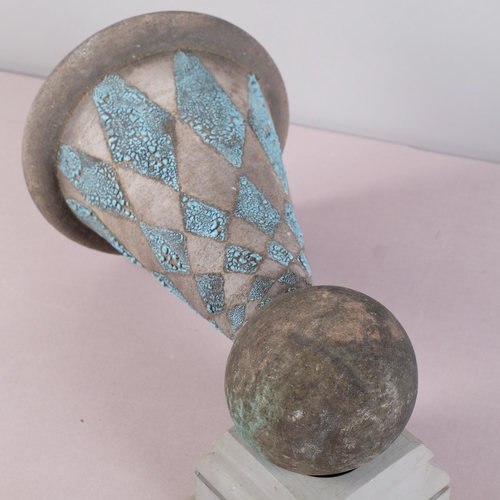 52 - A raku fired Urn form vessel with blue glaze, balanced on purpose built wooden plinth, unsigned, ove... 