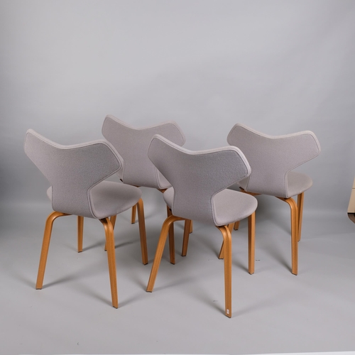 55 - A set of 4 ARNE JACOBSEN Grand Prix chairs by Fritz Hansen, the fully upholstered seat on shaped lam... 