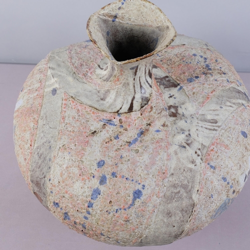 51 - JULIAN KING-SALTER (born 1954), a large twisted bottle form studio pottery vessel, with textured sur... 