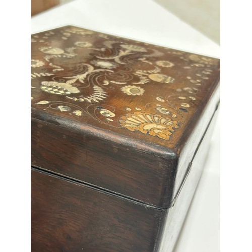 273 - A 19th century rosewood toilet/sewing box, with inlaid brass mother-of-pearl and amboyna marquetry d... 