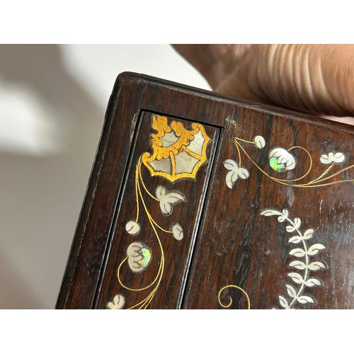 273 - A 19th century rosewood toilet/sewing box, with inlaid brass mother-of-pearl and amboyna marquetry d... 
