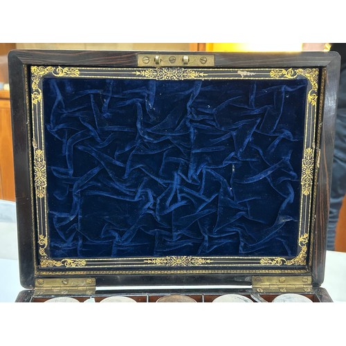 273 - A 19th century rosewood toilet/sewing box, with inlaid brass mother-of-pearl and amboyna marquetry d... 