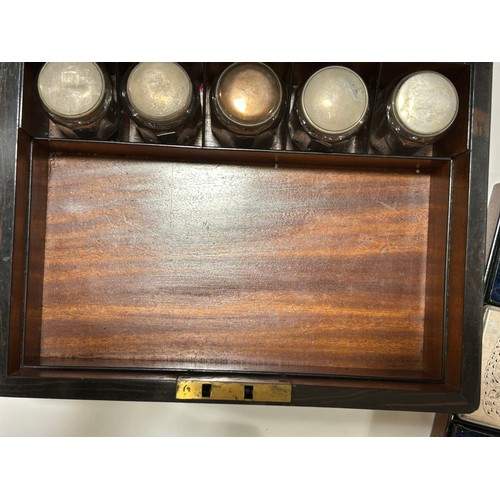 273 - A 19th century rosewood toilet/sewing box, with inlaid brass mother-of-pearl and amboyna marquetry d... 