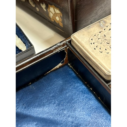 273 - A 19th century rosewood toilet/sewing box, with inlaid brass mother-of-pearl and amboyna marquetry d... 