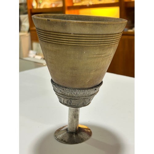 277 - A large Antique Continental rhino horn ceremonial cup, probably late 19th century, on unmarked white... 
