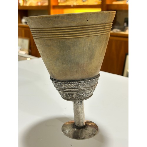 277 - A large Antique Continental rhino horn ceremonial cup, probably late 19th century, on unmarked white... 