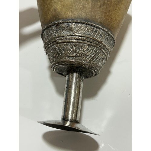 277 - A large Antique Continental rhino horn ceremonial cup, probably late 19th century, on unmarked white... 