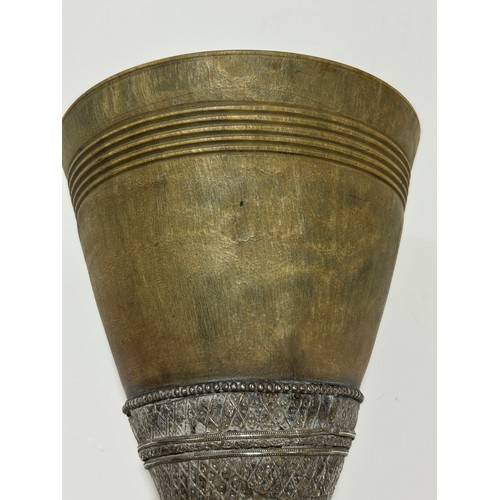 277 - A large Antique Continental rhino horn ceremonial cup, probably late 19th century, on unmarked white... 