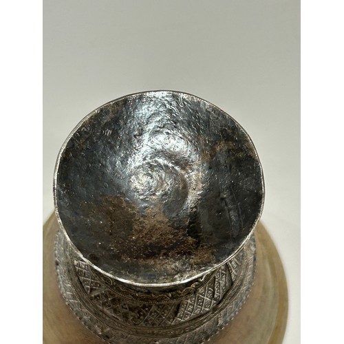 277 - A large Antique Continental rhino horn ceremonial cup, probably late 19th century, on unmarked white... 