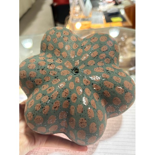 32 - KATE MALONE (b.1959-), British, a studio ceramic flower head or seed pod, double walled with varied ... 
