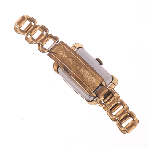 1058 - BULOVA - a Vintage gold plated stainless steel mechanical bracelet watch, circa 1940s, coppered dial... 