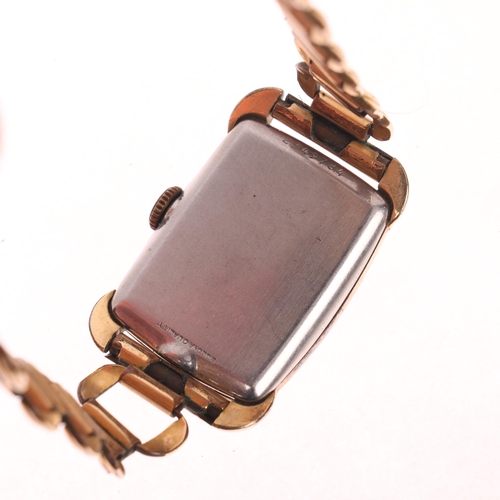 1058 - BULOVA - a Vintage gold plated stainless steel mechanical bracelet watch, circa 1940s, coppered dial... 