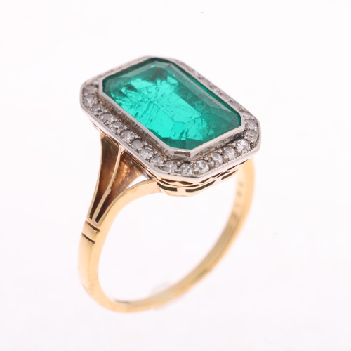1101 - An Art Deco 18ct gold emerald and diamond cluster ring, platinum-topped, rub-over set with 3.80ct oc... 