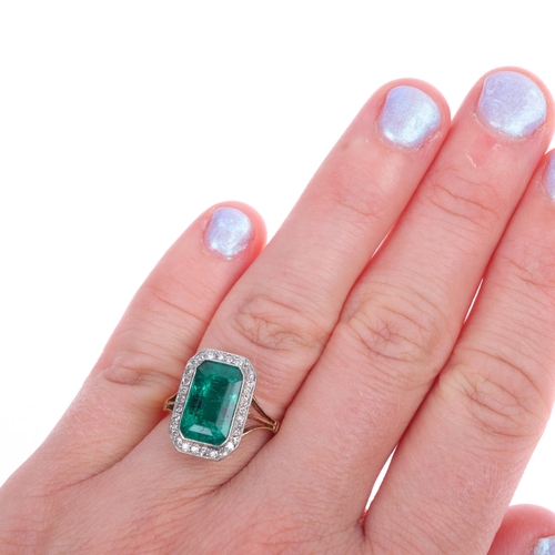 1101 - An Art Deco 18ct gold emerald and diamond cluster ring, platinum-topped, rub-over set with 3.80ct oc... 
