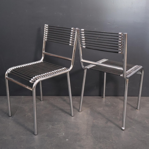 2053 - A set of 6 Rene Herbst Sandows No.212 Bauhaus design chairs, the chromed steel structure with bungee... 