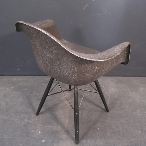 2056 - A Modernica Eames DAE fibreglass armchair in Elephant grey, with moulded maker’s marks. WITH THE OPT... 