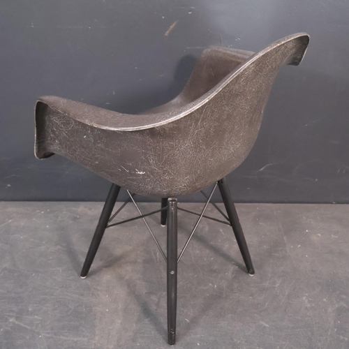 2057 - A Modernica Eames DAE fibreglass armchair in Elephant grey, with moulded maker’s marks.