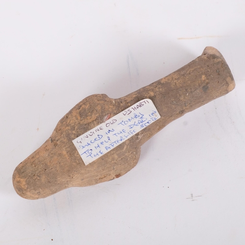 6 - An Ancient Egyptian terracotta Shabti figure, with incised text, H12.5cm