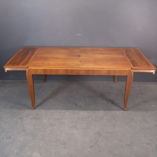 2013 - A French Art Deco dining table in walnut, with end drawers each of which support an extension leaf. ... 