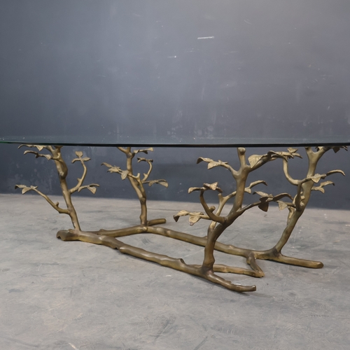 2016 - A mid-century coffee table, the bevelled oval glass top on cast bronze base in the form of branches ... 