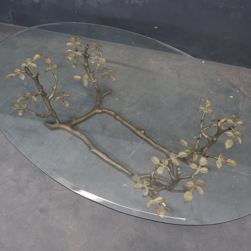 2016 - A mid-century coffee table, the bevelled oval glass top on cast bronze base in the form of branches ... 
