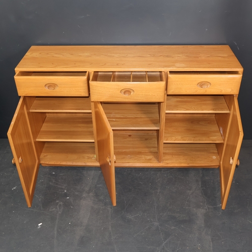 2037 - A contemporary Ercol high sideboard in solid ash, with three drawers over three doors in a clear fin... 
