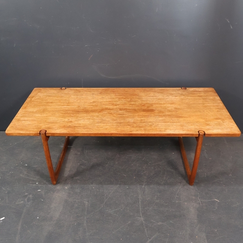 2045 - Peter Hvidt and Orla Molgaard Nielsen, a mid-century Danish coffee table with sled base design, made... 