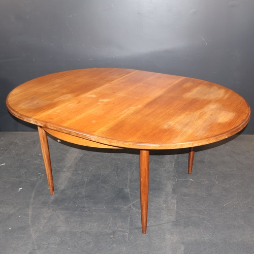 2051 - A vintage teak and afromosia extending circular Dining table by G Plan. EW168cm, W122cm, H74cm, D122... 