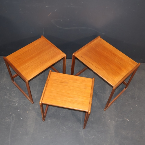 2052 - A vintage teak veneered nest of three rectangular tables by G Plan. W55cm, H48cm, D43cm.