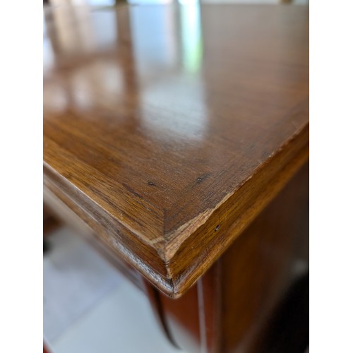 2010 - An American mid-century Art Deco desk with unusual curved pedestal end and foot. W110.5cm, H63cm, D4... 