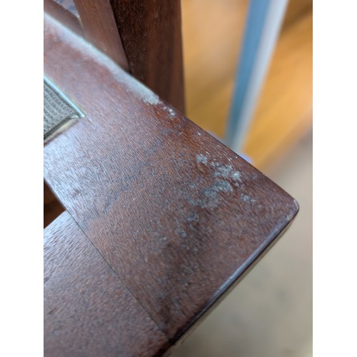 2021 - A Pair of Brazilian Rosewood custom made Lounge chairs with mesh webbing and cane threaded backrests... 
