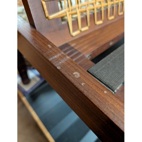 2021 - A Pair of Brazilian Rosewood custom made Lounge chairs with mesh webbing and cane threaded backrests... 