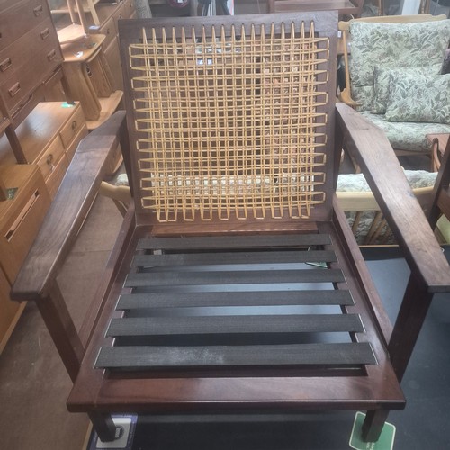 2021 - A Pair of Brazilian Rosewood custom made Lounge chairs with mesh webbing and cane threaded backrests... 