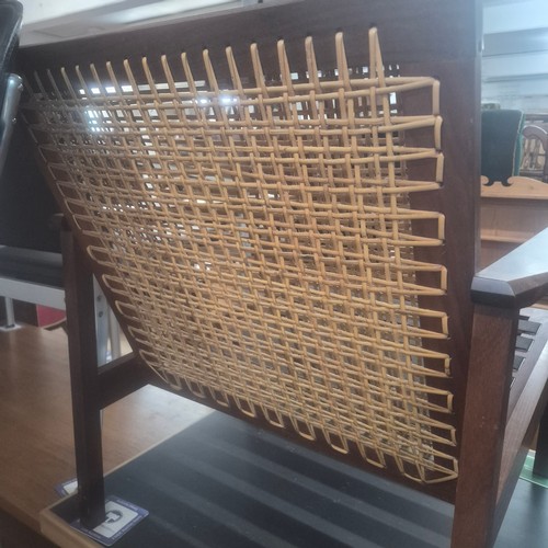 2021 - A Pair of Brazilian Rosewood custom made Lounge chairs with mesh webbing and cane threaded backrests... 